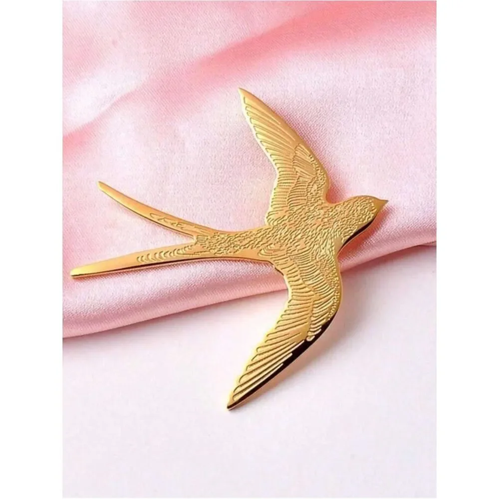 Anthropologie elegant gold